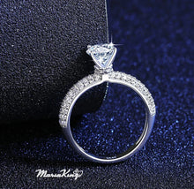 Load image into Gallery viewer, 1 Ct. Brilliant Round Cut Solitaire, GRA certified Moissanite Ring - MariaKinz