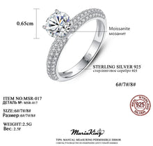 Load image into Gallery viewer, 1 Ct. Brilliant Round Cut Solitaire, GRA certified Moissanite Ring - MariaKinz
