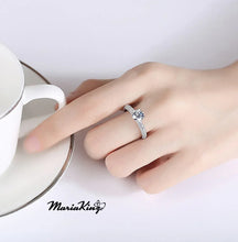 Load image into Gallery viewer, 1 Ct. Brilliant Round Cut Solitaire, GRA certified Moissanite Ring - MariaKinz